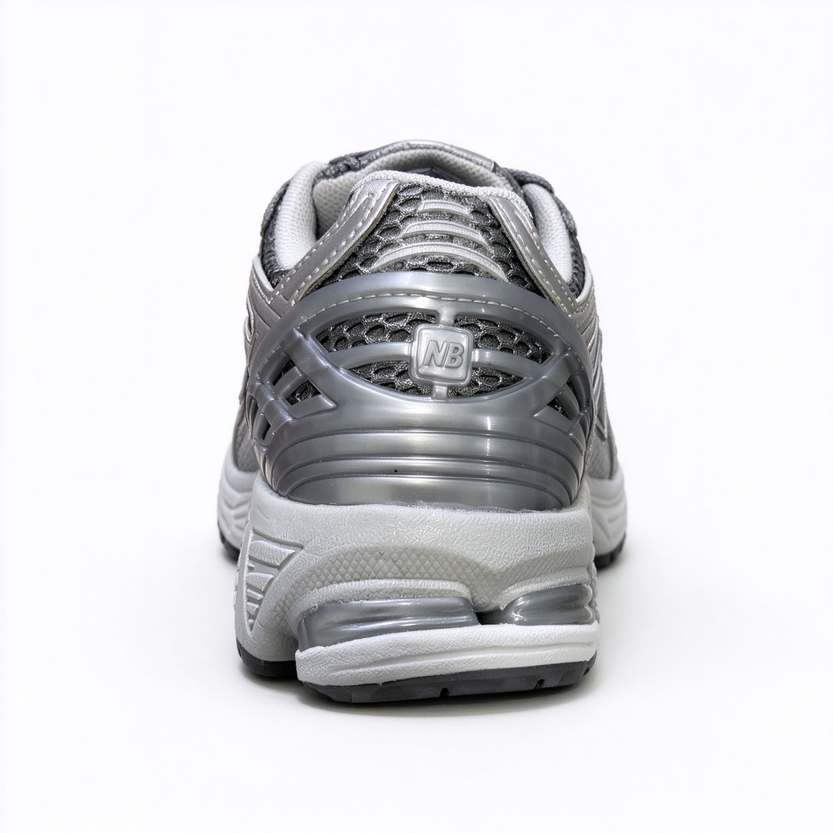 New Balance Classic Y2K retro running sneakers 1906R silver grey metallic colorway, unisex dad shoes for men and women.