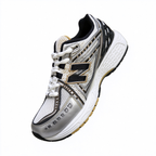 New Balance Classic Y2K retro running sneakers 1906R silver white gold metallic colorway, unisex dad shoes for men and women.