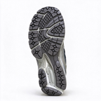 New Balance Classic Y2K retro running sneakers 1906R silver grey metallic colorway, unisex dad shoes for men and women.