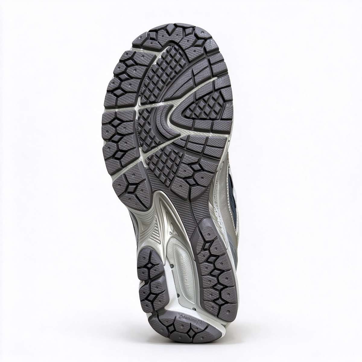 New Balance Classic Y2K retro running sneakers 1906R silver grey metallic colorway, unisex dad shoes for men and women.
