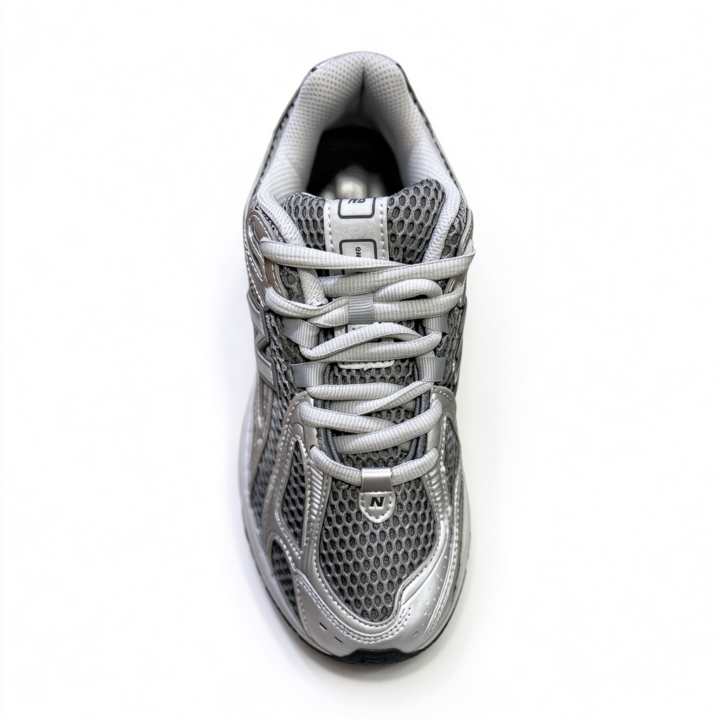 New Balance Classic Y2K retro running sneakers 1906R silver grey metallic colorway, unisex dad shoes for men and women.