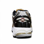 New Balance Classic Y2K retro running sneakers 1906R silver white gold metallic colorway, unisex dad shoes for men and women.