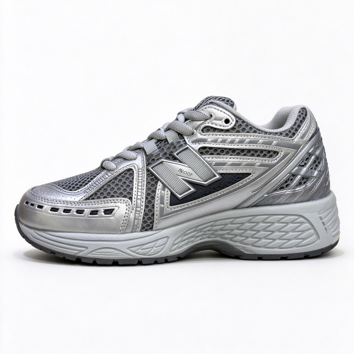 New Balance Classic Y2K retro running sneakers 1906R silver grey metallic colorway, unisex dad shoes for men and women.